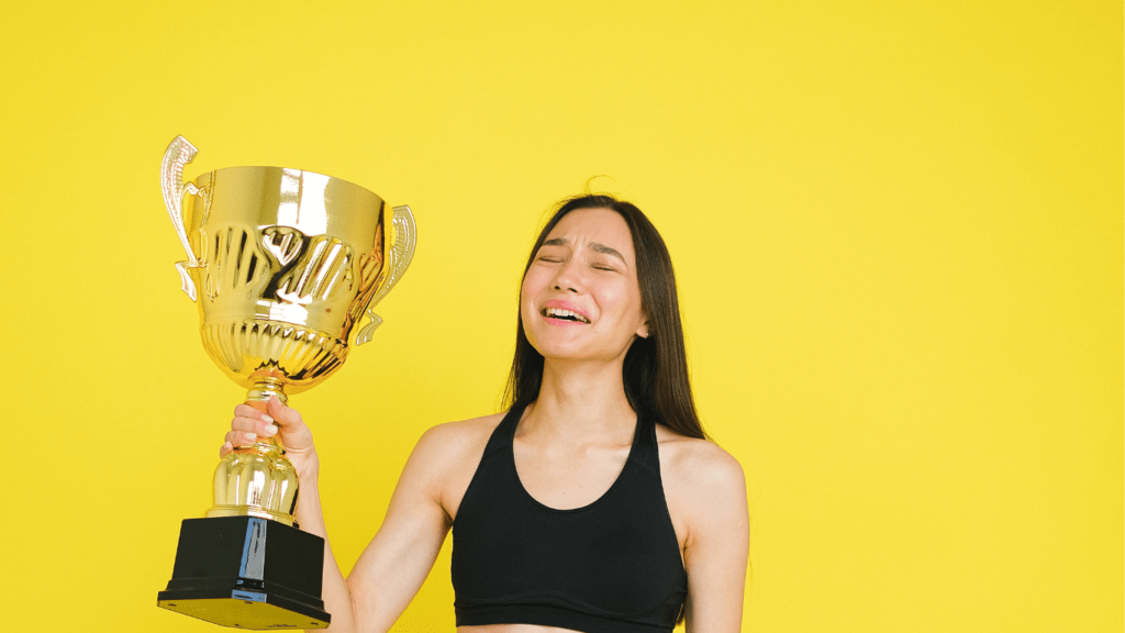 Woman holding a Trophy